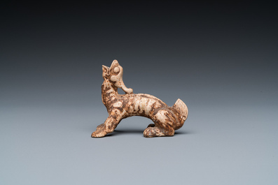 A small Chinese terracotta model of a mythical animal, mingqi, Han