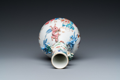 A Chinese famille rose '18 Luohans' bottle vase, 19th C.