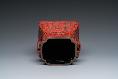 A Chinese red cinnabar lacquer 'fanghu' vase, 19/20th C.