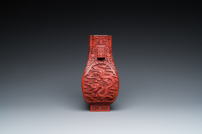A Chinese red cinnabar lacquer 'fanghu' vase, 19/20th C.