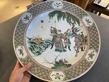 A Chinese famille verte dish with an emperor watching a carp, Kangxi