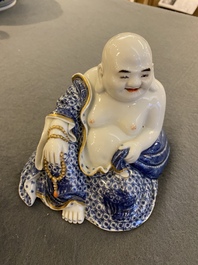 A Chinese blue and white seated Buddha, You Lin Ji Zao 游林記造 mark, Republic