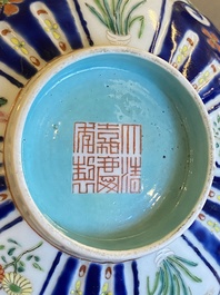 A Chinese famille rose 'butterflies' bowl, Jiaqing mark, 19th C.