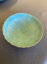 A Chinese famille rose 'butterflies' bowl, Jiaqing mark, 19th C.