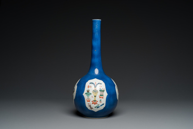 A Chinese famille verte powder-blue-ground bottle vase, Kangxi