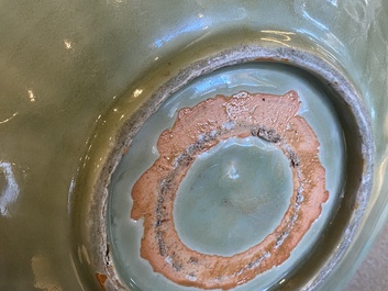 Two Chinese Longquan celadon dishes with underglaze design, Ming
