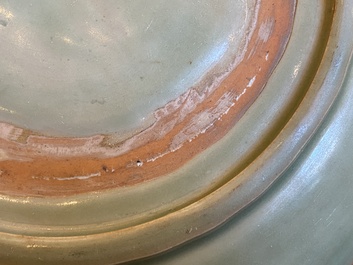 Two Chinese Longquan celadon dishes with underglaze design, Ming