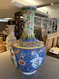 A Chinese famille verte bottle vase, Kangxi mark, 19/20th C.