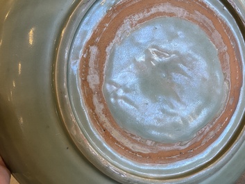 Two Chinese Longquan celadon dishes with underglaze design, Ming