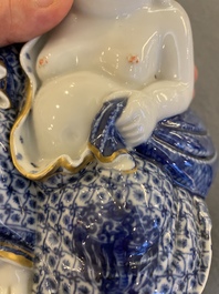 A Chinese blue and white seated Buddha, You Lin Ji Zao 游林記造 mark, Republic