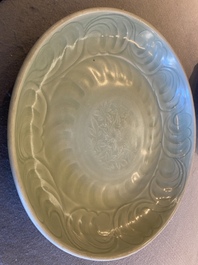 Two Chinese Longquan celadon dishes with underglaze design, Ming