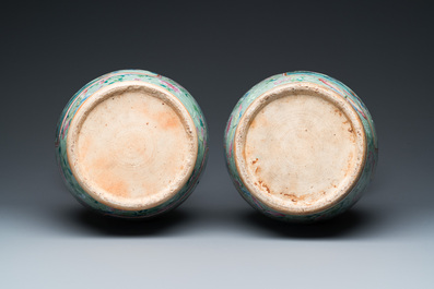 A pair of Chinese famille rose celadon-ground vases, 19th C.