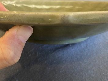 Two Chinese Longquan celadon dishes with underglaze design, Ming