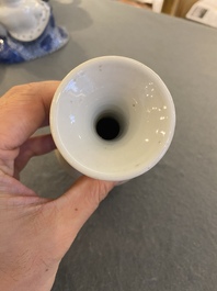 A Chinese blue and white double gourd vase with caf&eacute; au lait-ground base, Kangxi