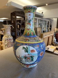 A Chinese famille verte bottle vase, Kangxi mark, 19/20th C.