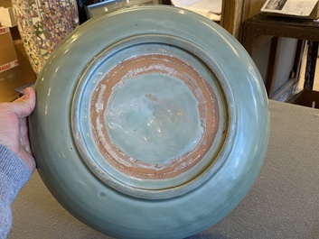 Two Chinese Longquan celadon dishes with underglaze design, Ming