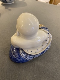 A Chinese blue and white seated Buddha, You Lin Ji Zao 游林記造 mark, Republic
