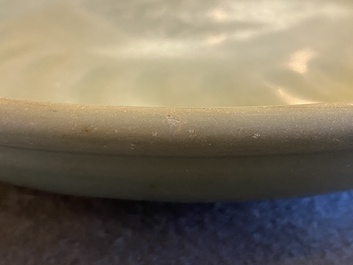Two Chinese Longquan celadon dishes with underglaze design, Ming