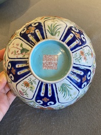 A Chinese famille rose 'butterflies' bowl, Jiaqing mark, 19th C.