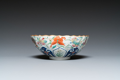 A Chinese famille rose 'butterflies' bowl, Jiaqing mark, 19th C.