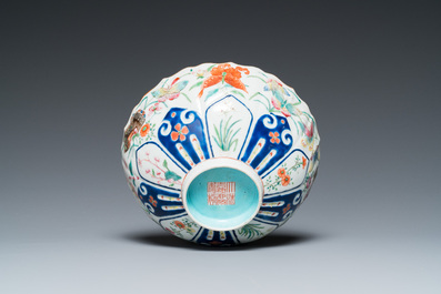 A Chinese famille rose 'butterflies' bowl, Jiaqing mark, 19th C.