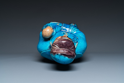 A large Chinese partly lacquered turquoise-glazed figure of the star god 'Fuxing', 18/19th C.