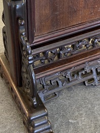 A Chinese famille rose plaque mounted as a table screen, Qianlong
