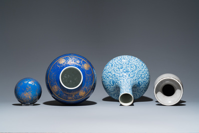 Three Chinese blue and white, crackle-glazed and powder-blue vases, 19th C.