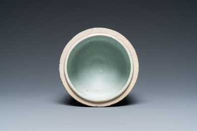 A Korean blue and white jar with floral design and calligraphy, Joseon, 18th C.