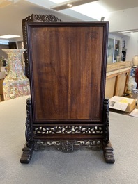 A Chinese famille rose plaque mounted as a table screen, Qianlong