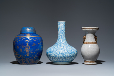 Three Chinese blue and white, crackle-glazed and powder-blue vases, 19th C.
