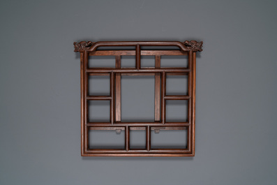 A Chinese foldable huali wooden book stand with brass mounts, Qing