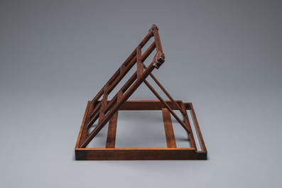 A Chinese foldable huali wooden book stand with brass mounts, Qing