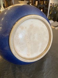 A Chinese famille verte powder-blue-ground bottle vase, Kangxi