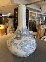 A Korean blue and white 'dragon' bottle vase, Joseon, 18/19th C.