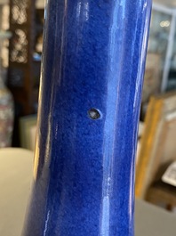 A Chinese famille verte powder-blue-ground bottle vase, Kangxi