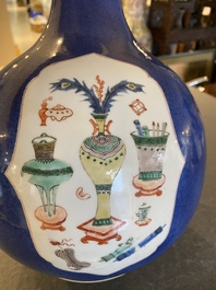 A Chinese famille verte powder-blue-ground bottle vase, Kangxi