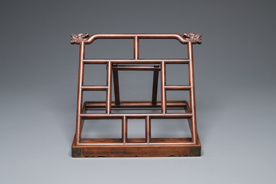 A Chinese foldable huali wooden book stand with brass mounts, Qing
