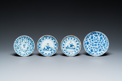 Eleven Chinese blue and white saucers, seven cups and a bowl, Kangxi/Qianlong