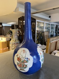 A Chinese famille verte powder-blue-ground bottle vase, Kangxi