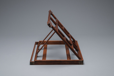 A Chinese foldable huali wooden book stand with brass mounts, Qing