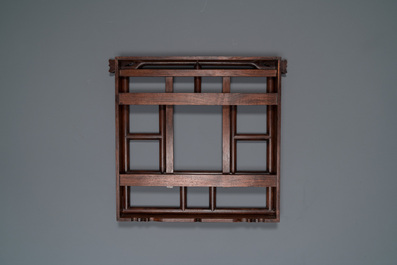 A Chinese foldable huali wooden book stand with brass mounts, Qing