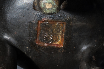 A Chinese bronze tripod 'taotie' censer, Ming