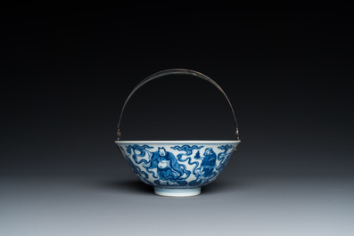 A Chinese blue and white 'eight immortals' bowl with silver handle, Qianlong mark and of the period