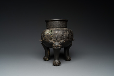 A Chinese bronze tripod 'taotie' censer, Ming
