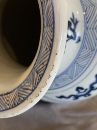 A large Chinese blue and white rouleau vase with floral design, Kangxi