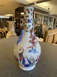 A Chinese famille rose '18 Luohans' bottle vase, 19th C.
