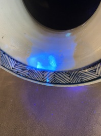 A large Chinese blue and white rouleau vase with floral design, Kangxi