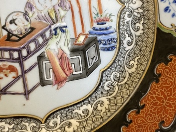A pair of Chinese famille rose plates with a lady doing her make-up, Yongzheng