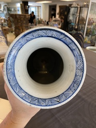 A large Chinese blue and white rouleau vase with floral design, Kangxi